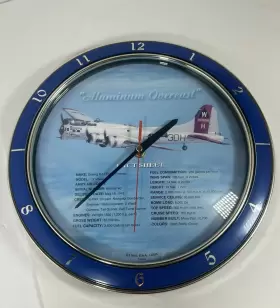 Vintage Sign Company C100 B-17 Fact Sheet Clock 11 Inch Round. Working
