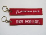 Boeing F-18 Hornet Keychain Remove Before Flight Navy Strike Fighter Top Gun New. Price: $14.99.