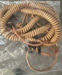 David Clark, Headset Extension Cord (coiled) Ft. C31-26DG In Day Glow Orange Used. Price: $400.00.